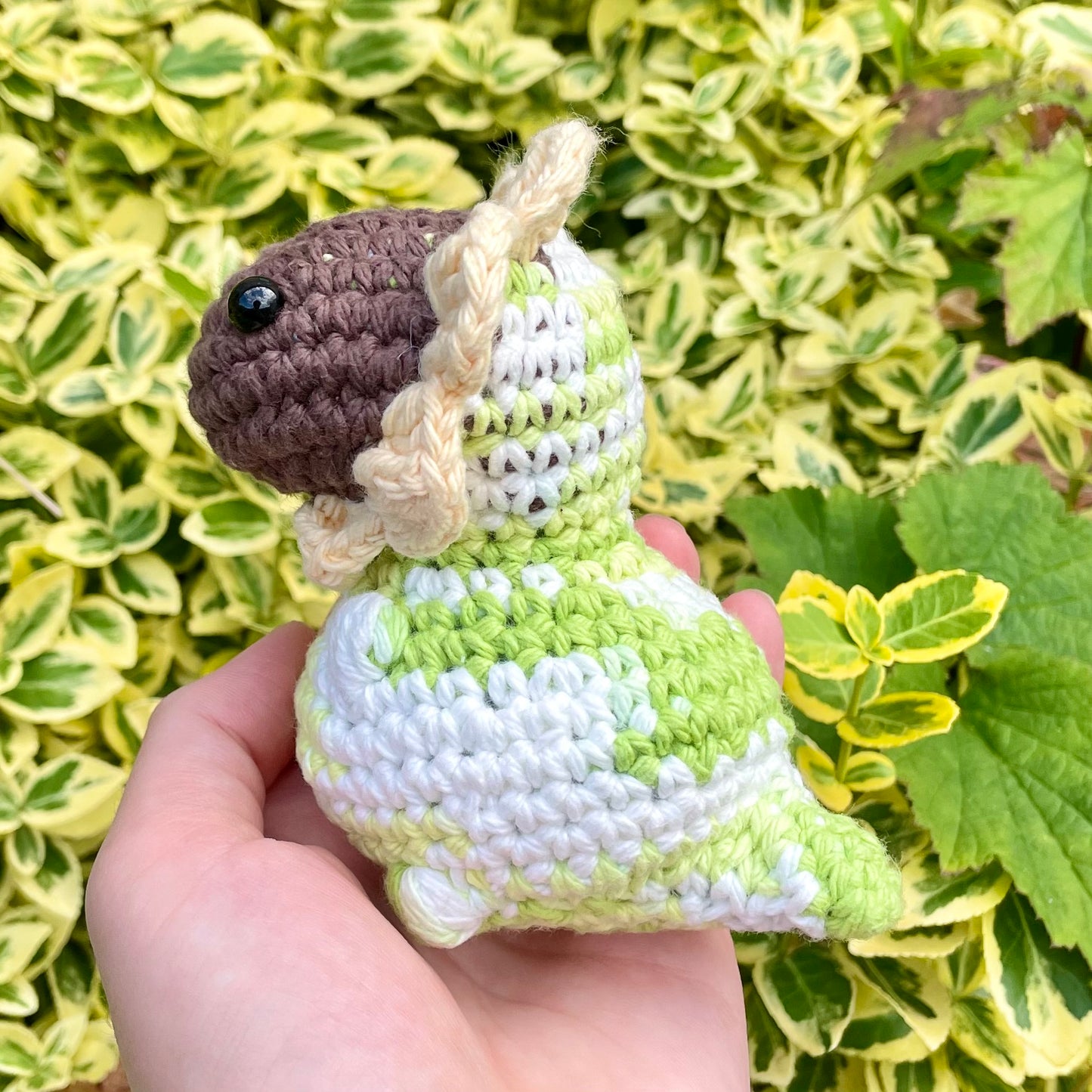 Patches the Green and White Dino with Yellow Sunflower Crown Crocheted Plushie